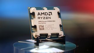 AMD Ryzen 9 9950X3D2 desktop processor on a display stand with a blurred background