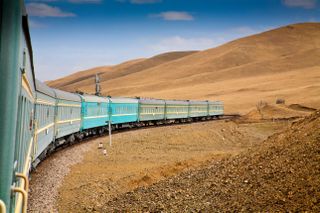 The Trans Mongoian railway rolls through the mountains near Ulaanbaatar