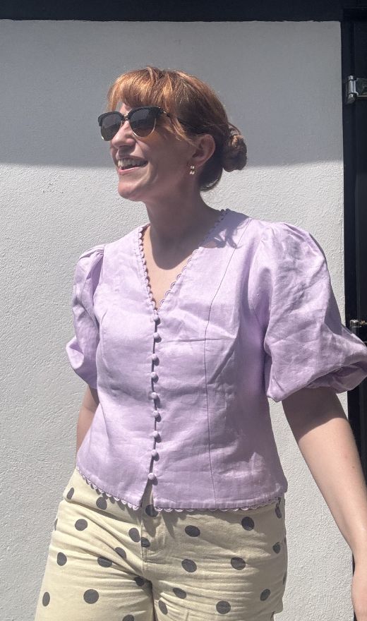 matilda wearing the mint velvet puffed sleeve top