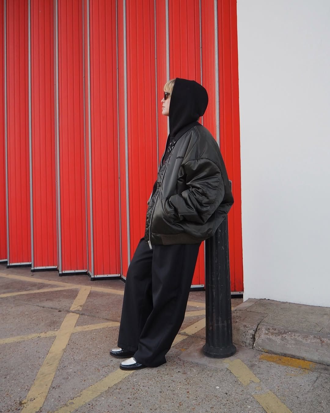 @alexisforeman wears an oversized bomber jacket