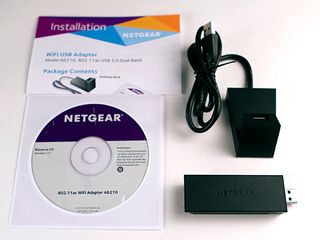 Figure 9 - The contents of the Netgear A6210. Note the desktop cradle with the integrated USB 3.0 extension cable for optimal positioning both of the adapter and the antenna.