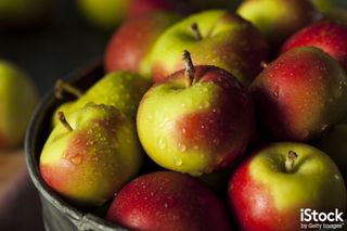 Raw organic lady apples by bhofack2. This image could get readers of a recipe newsletter salivating and eager to read more