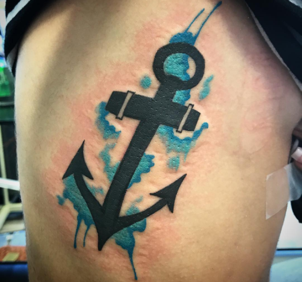 Watercolour anchor tattoo