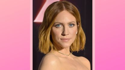 Brittany Snow attends a photo call for the Los Angeles premiere of A24's "X" at TCL Chinese 6 Theatres on March 15, 2022 in Los Angeles, California