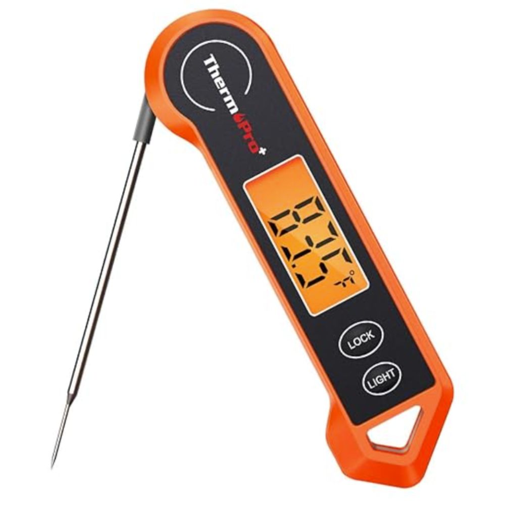 Orange and black digital meat thermometer