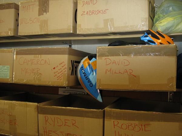 Every rider has a race bag, stored in these boxes at the service course. The bag contains helmets, gloves, raingear and spare shoes, so that the riders themselves don't have to worry about bringing them to races.