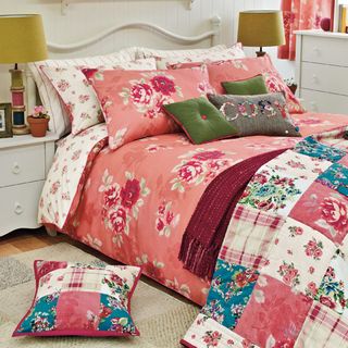 bedroom with floral bed linens