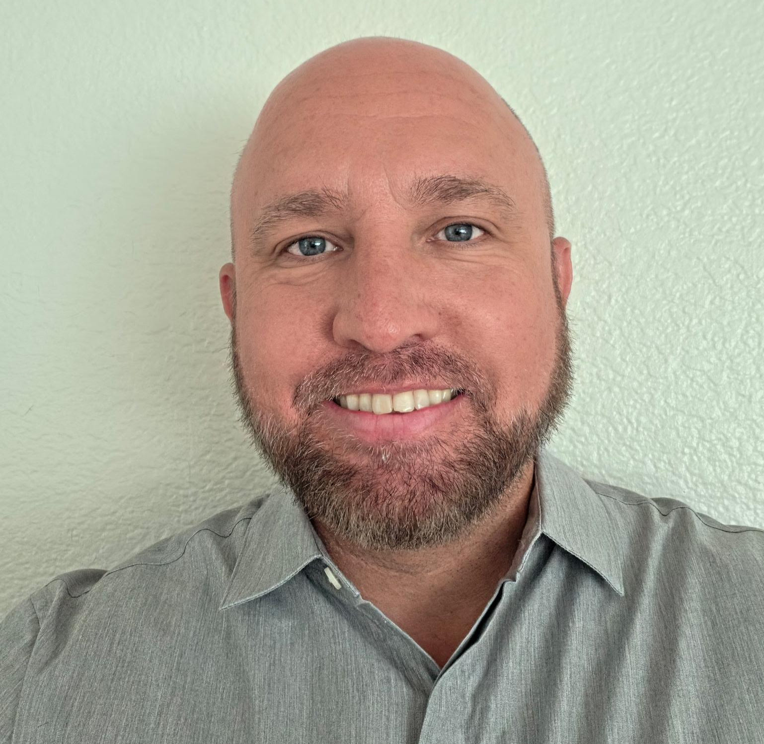 Smiling headshot of Mark Vinten.