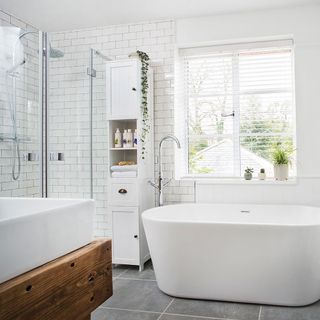 modern bathroom with brick blanco tiles and orchard wharfe bath