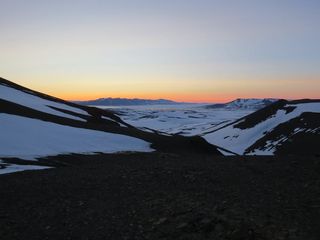 Midnight sunset in the pristine northeast Greenland wilderness.