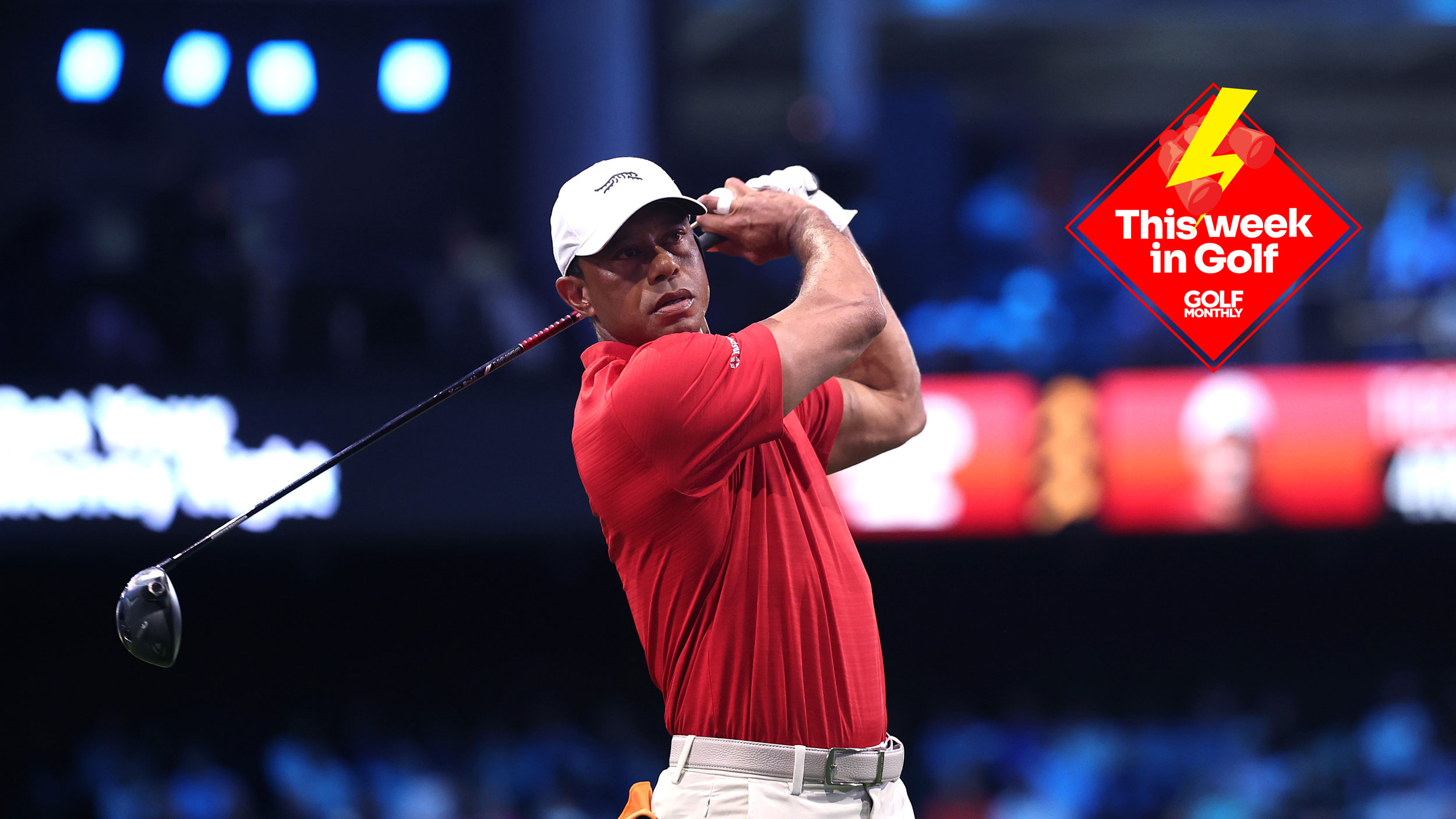 Tiger Woods hits a drive in TGL during the 2026 season with a This Week In Golf sticker in the top right