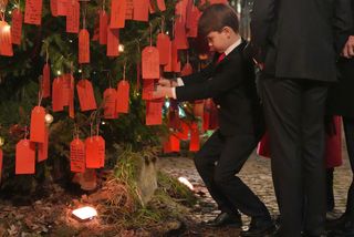 Prince Louis at the "Kindness Tree" at the "Together At Christmas" Carol Service at Westminster Abbey.