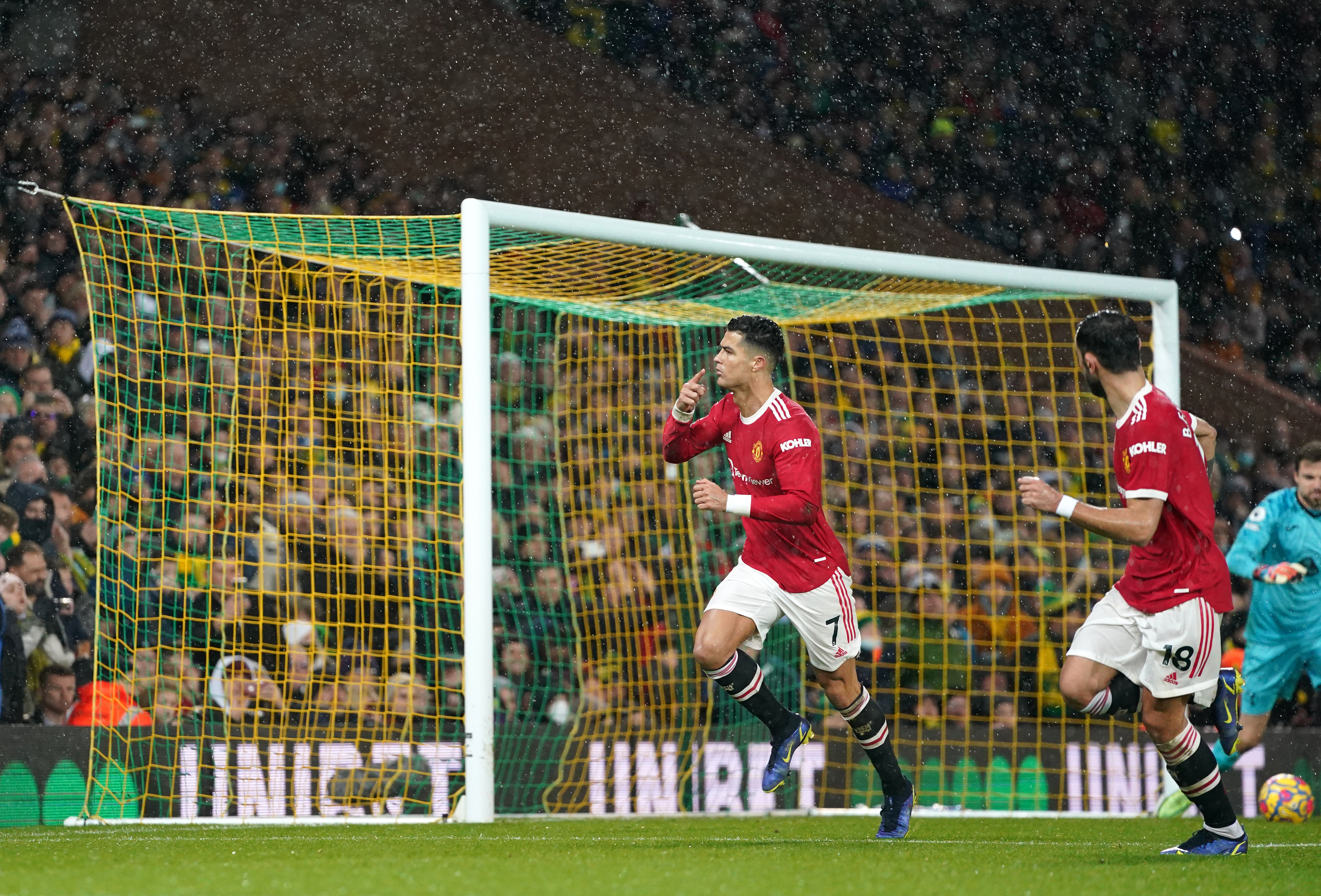 Norwich, UK. 11th Dec, 2021. Cristiano Ronaldo of Manchester United scores  the only goal of the game from the penalty spot during the Premier League  match between Norwich City and Manchester United