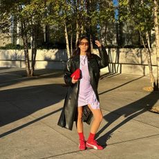 Fashion influencer and stylist Michelle Li wearing chic autumn footwear with socks.