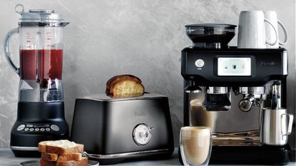 Breville vs Sage: some Breville kitchen appliances: a toaster, espresso machine, and blender on a countertop