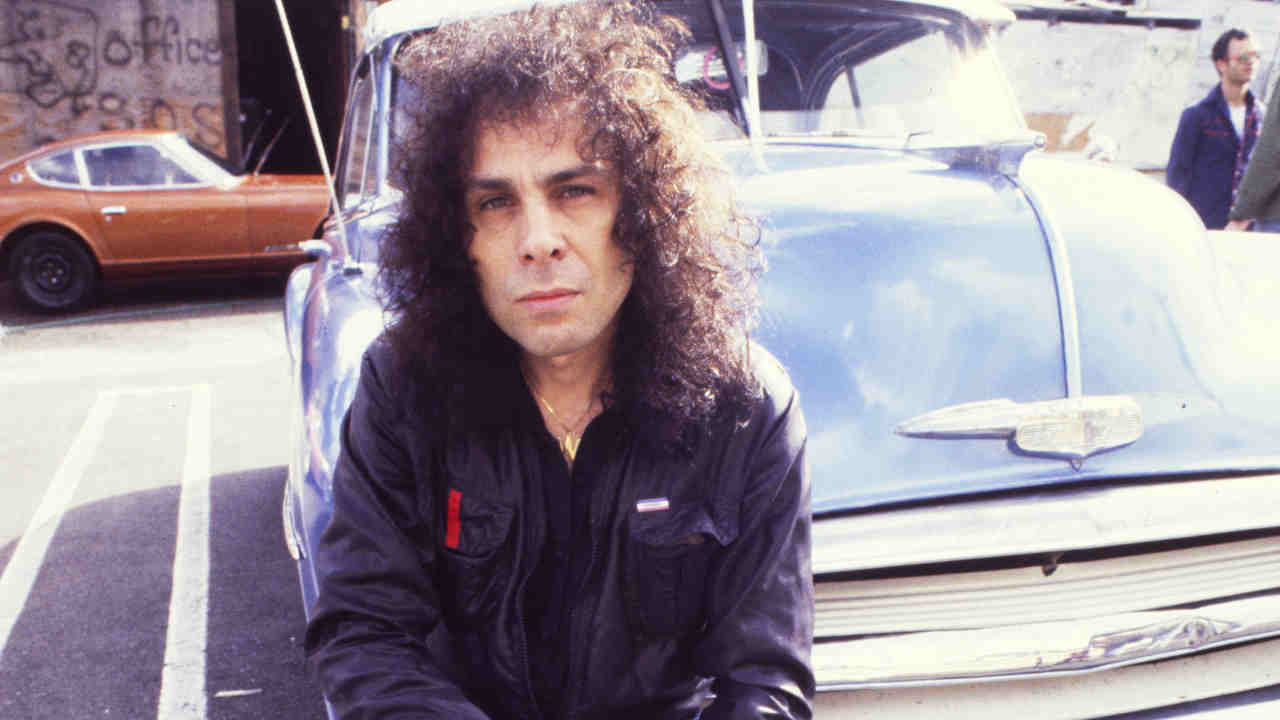 Ronnie James Dio posing for a photograph in the 1980s