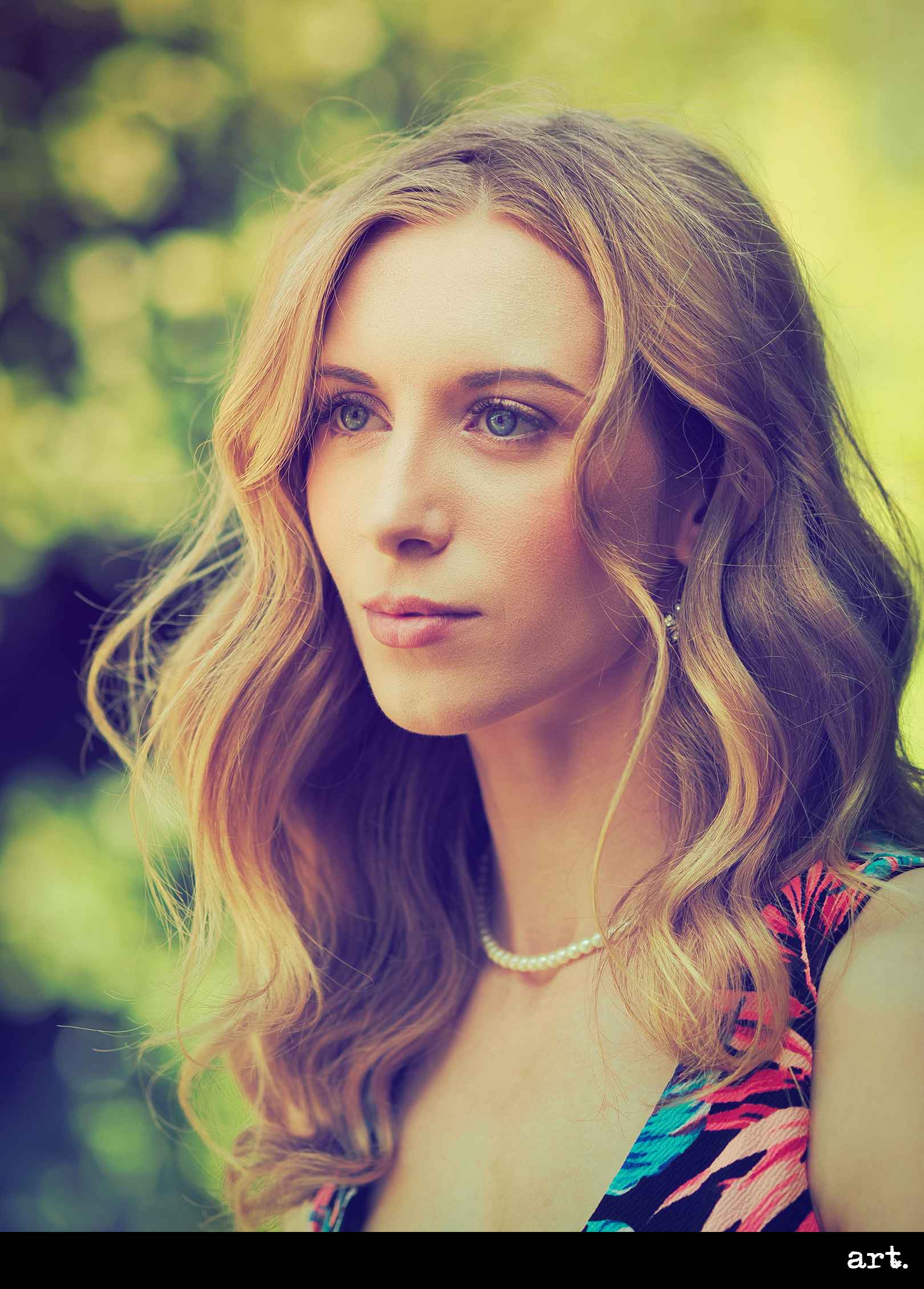 Professional portraits of a female model taken on the OM System OM-3 by photographer James Artaius