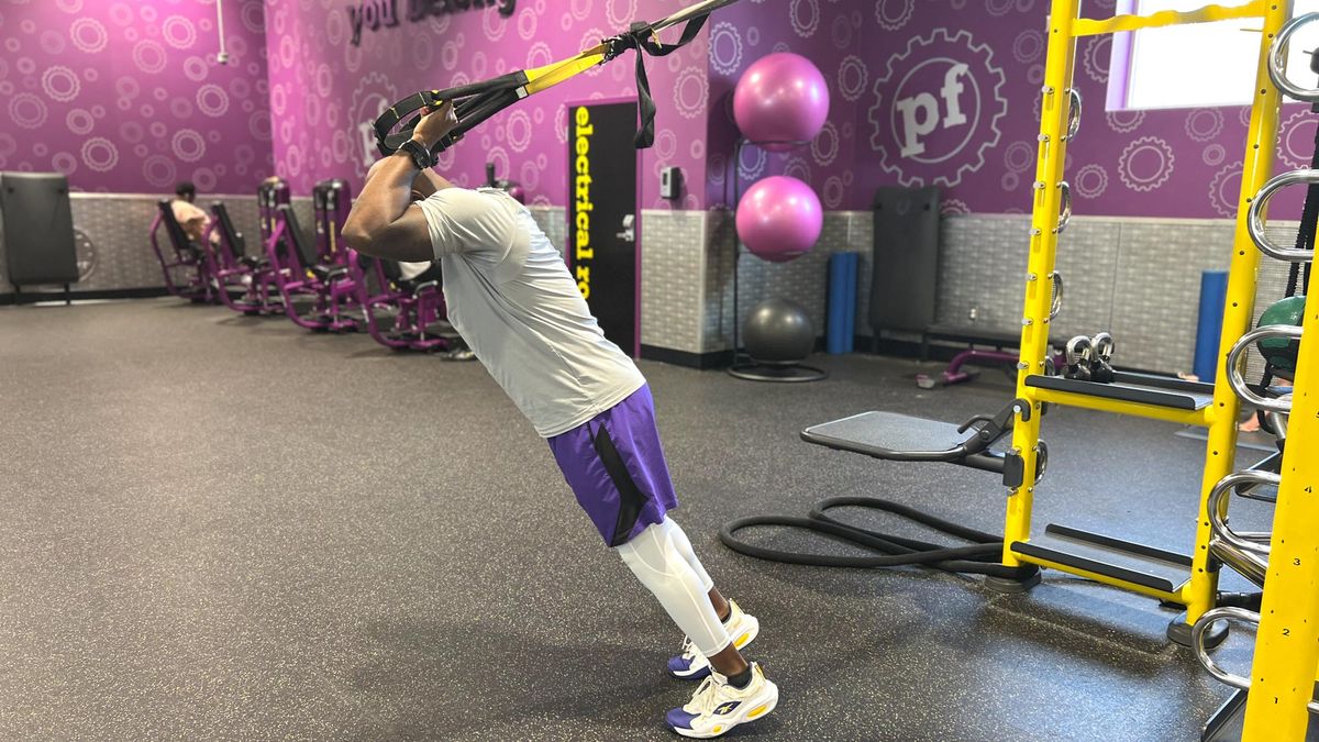 Teddy Savage starting a TRX triceps extension