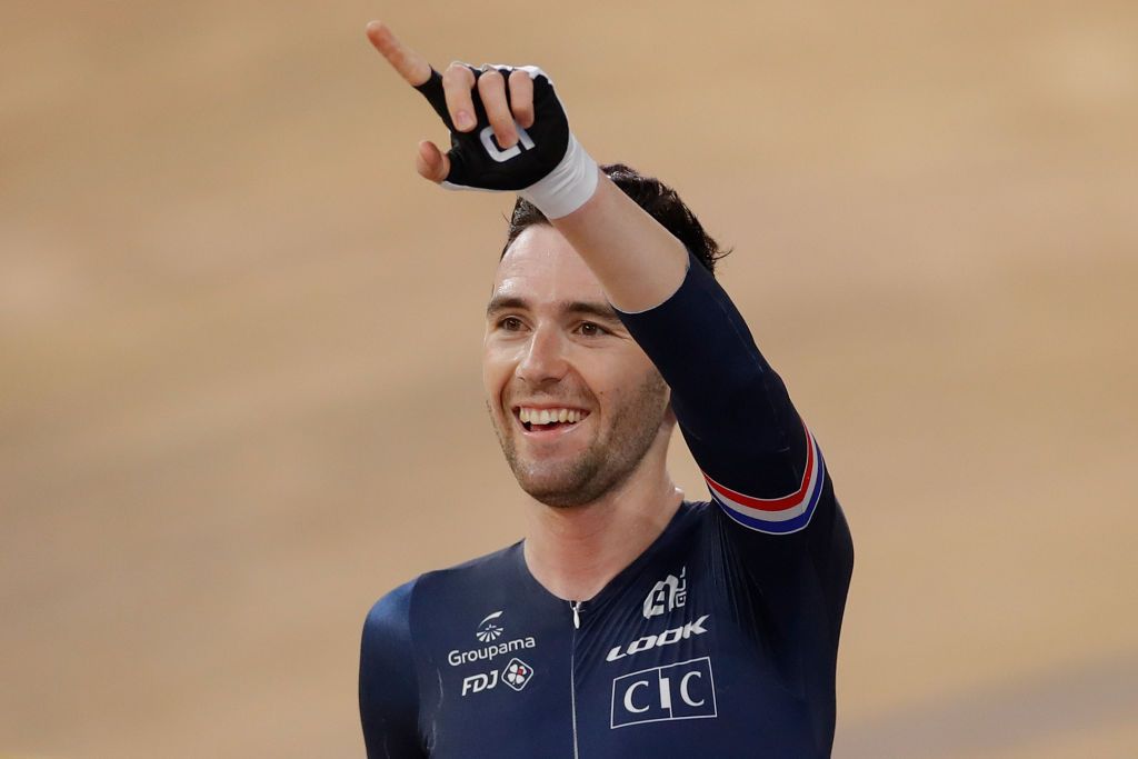 Frances Benjamin Thomas celebrates Gold in the mens omnium elimination race and points race at the UCI track cycling World Championship at the velodrome in Berlin on February 29 2020 Photo by Odd ANDERSEN AFP Photo by ODD ANDERSENAFP via Getty Images