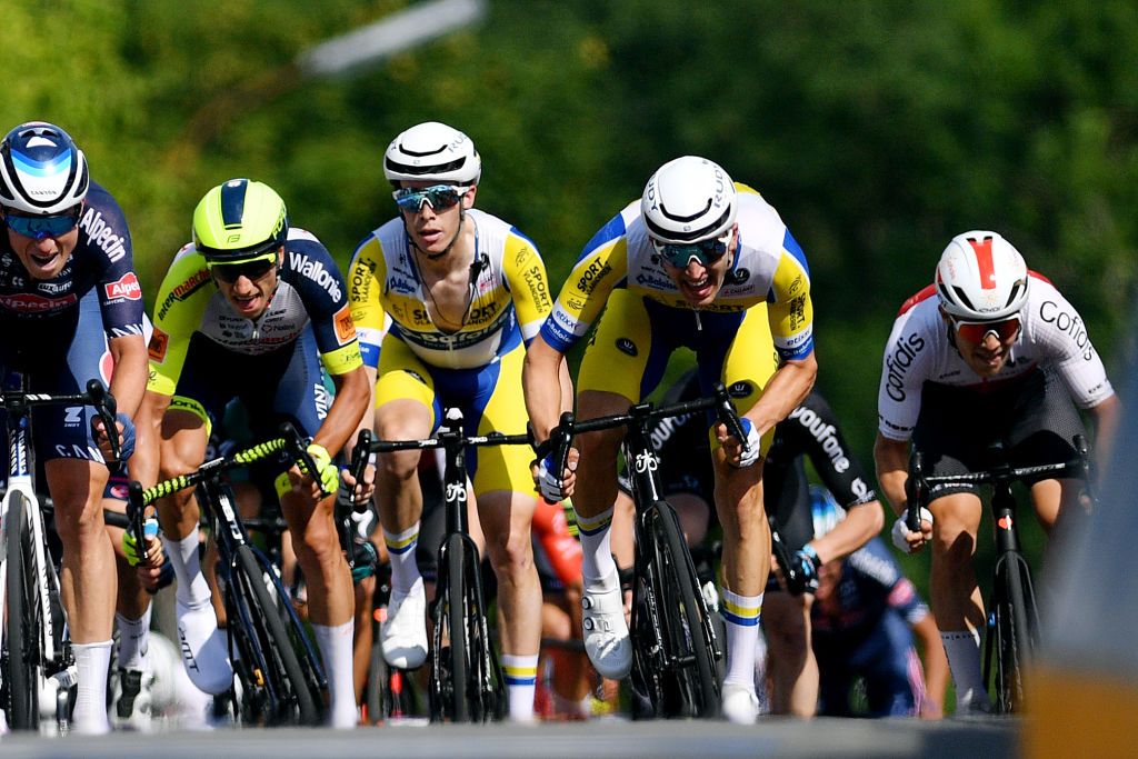 MAARKEDAL BELGIUM JUNE 15 LR Jasper Philipsen of Belgium and Team AlpecinFenix Quinten Hermans of Belgium and Team Intermarch Wanty Gobert Matriaux Julian Mertens of Belgium and Team Sport Vlaanderen Baloise Robbe Ghys of Belgium and Team Sport Vlaanderen Baloise and Axel Zingle of France and Team Cofidis sprint to win during the 91st Baloise Belgium Tour 2022 Stage 1 a 165km stage from Merelbeke to Merelbeke BaloiseBelgiumTour on June 15 2022 in Maarkedal Belgium Photo by Luc ClaessenGetty Images