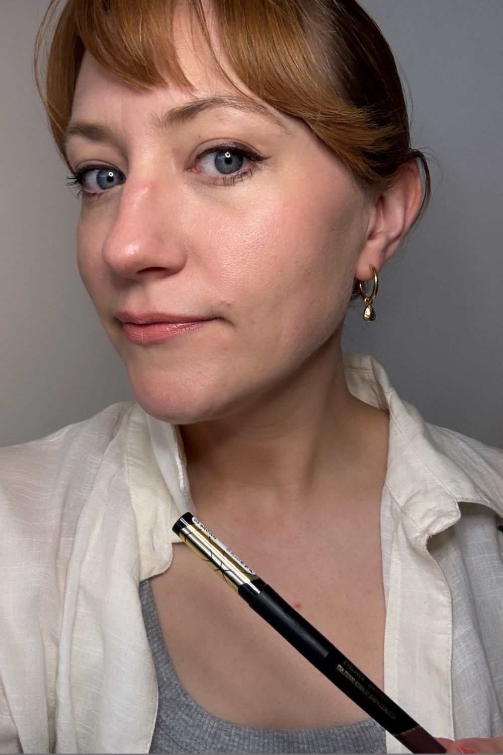 a headshot of matilda with loreal eyeliner