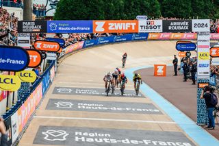 Riders at the finish of Paris-Roubaix 2024