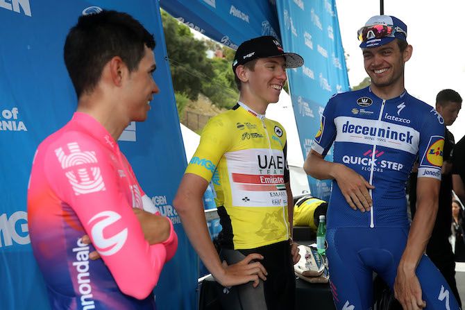 The top three overall at the 2019 Tour of California &ndash; winner Tadej Pogacar (UAE Team Emirates), EF Education FIrst's Sergio Higuita and Deceuninck-QuickStep's Kasper Asgreen &ndash; share a joke behind the podium in Pasadena