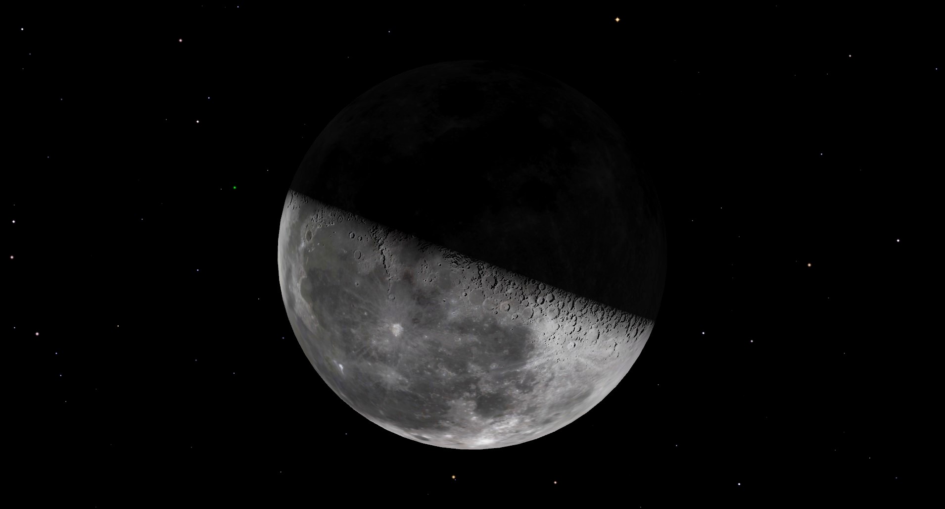 A close up of the moon in space with a shadow across the top third.