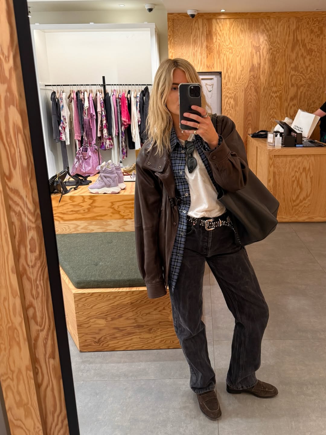 lucywilliams02 wears jeans brown leather jacket and blue shirt