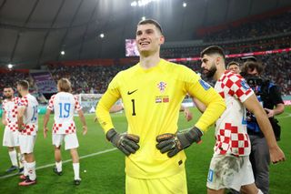 Dominik Livakovic of Croatia celebrates after the team's victory during the FIFA World Cup Qatar 2022 3rd Place match between Croatia and Morocco at Khalifa International Stadium on December 17, 2022 in Doha, Qatar.