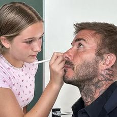David Beckham getting his makeup done by daughter Harper