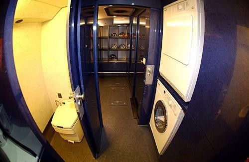 An on board washing machine, tumble dryer and toilet