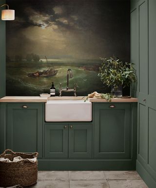 sage green Shaker utility room with wall mural
