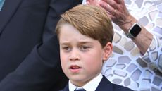 Prince George facing 'doubly hard' time. Seen here is Prince George at the Men's Singles Final at Wimbledon