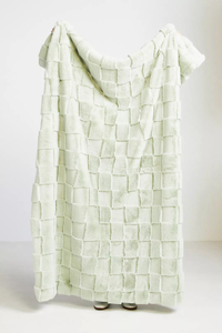 Carved Check Faux Fur Throw Blanket: was $138 now $94 @ Anthropologie