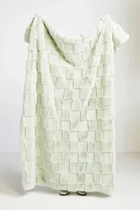 Carved Check Faux Fur Throw Blanket: was $138 now $94 @ Anthropologie