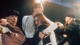 Leonardo DiCaprio and Kate Winslet embrace as boat sinks in Titanic