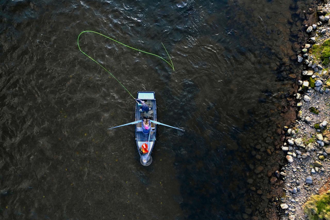 Overhead of men flyfishing on the Junction Beat in Kelso