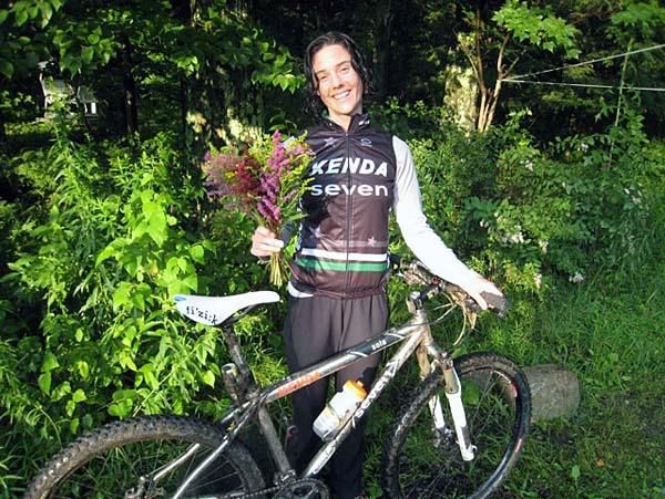 Post-race photo, complete with World Cup podium flowers for Mary.