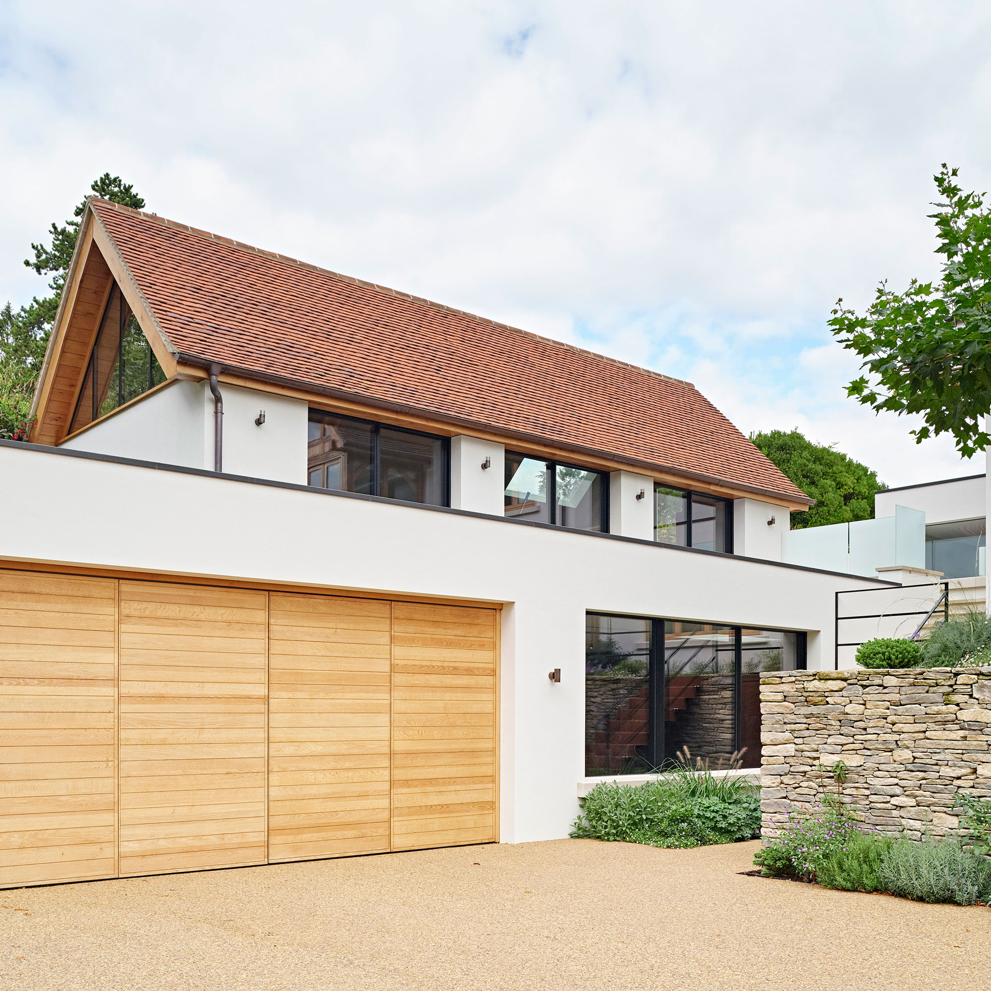 contemporary house with resin driveway