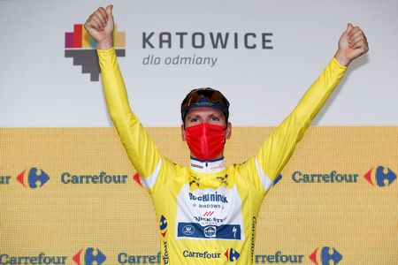 KATOWICE POLAND AUGUST 14 Joo Pedro Gonalves Almeida of Portugal and Team Deceuninck QuickStep celebrates winning the Yellow Leader Jersey on the podium ceremony after the 78th Tour de Pologne 2021 Stage 6 a 19km Individual Time Trial stage from Katowice to Katowice TourdePologne TDP2021 UCIWT on August 14 2021 in Katowice Poland Photo by Bas CzerwinskiGetty Images