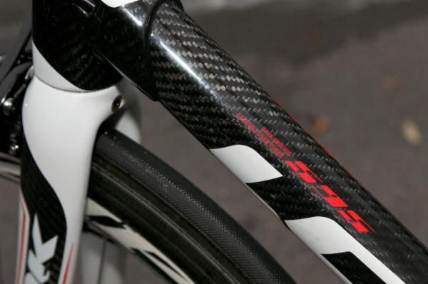 The frame tubes are largely unpainted.