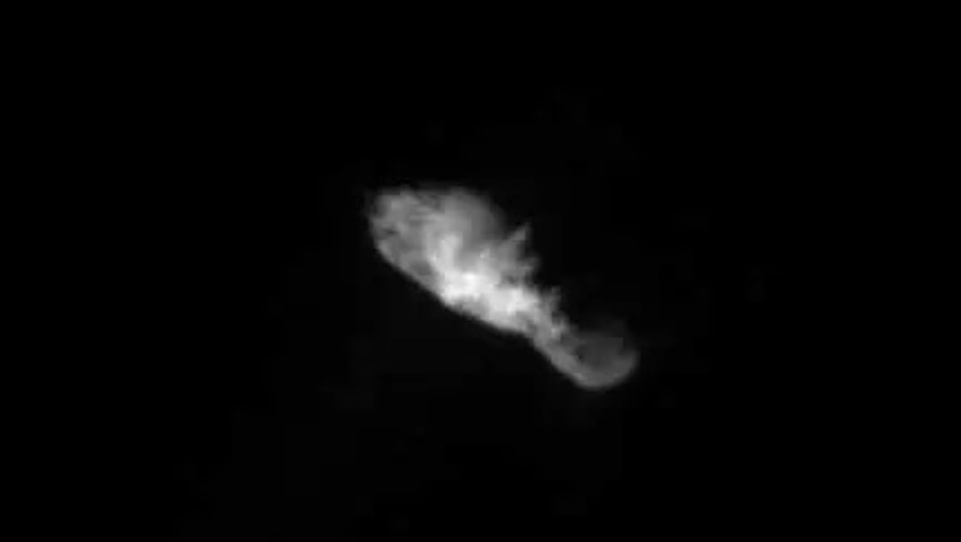 a blurry image of a comet