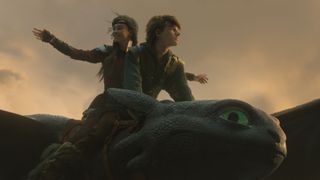 Nico Parker as Astrid and Mason Thames as Hiccup riding on Toothless in How to Train Your Dragon