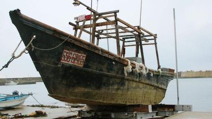 An abandoned ship that washed ashore in Japan.