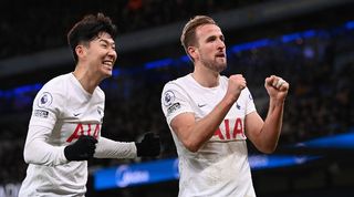 Harry Kane and Son Heung-min celebrate a goal for Tottenham against Manchester City in February 2022.