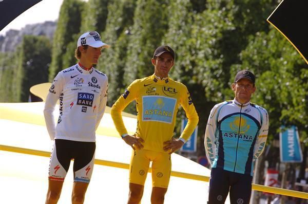 Andy Schleck (Saxo Bank), Alberto Contador (Astana) and Lance Armstrong (Astana) await the Spanish national anthem