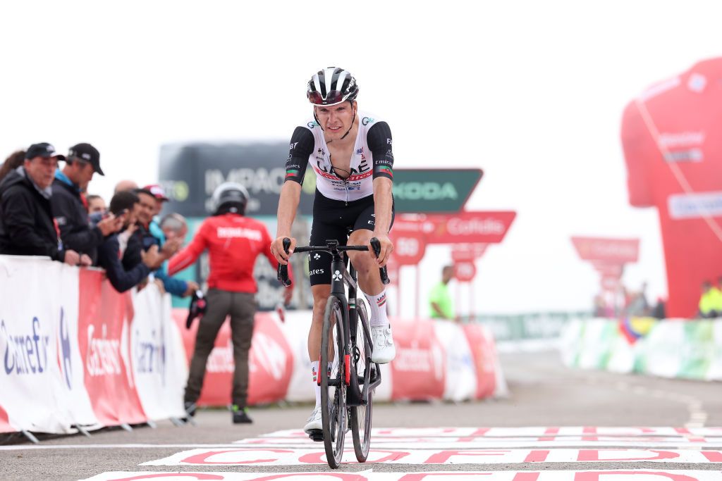 ALTU DE LANGLIRU SPAIN SEPTEMBER 13 Joao Almeida of Portugal and UAE Team Emirates crosses the finish line during the 78th Tour of Spain 2023 Stage 17 a 1244km stage from Ribadesella Ribeseya to Altu de LAngliru 1555m UCIWT on September 13 2023 in Altu de LAngliru Spain Photo by Alexander HassensteinGetty Images