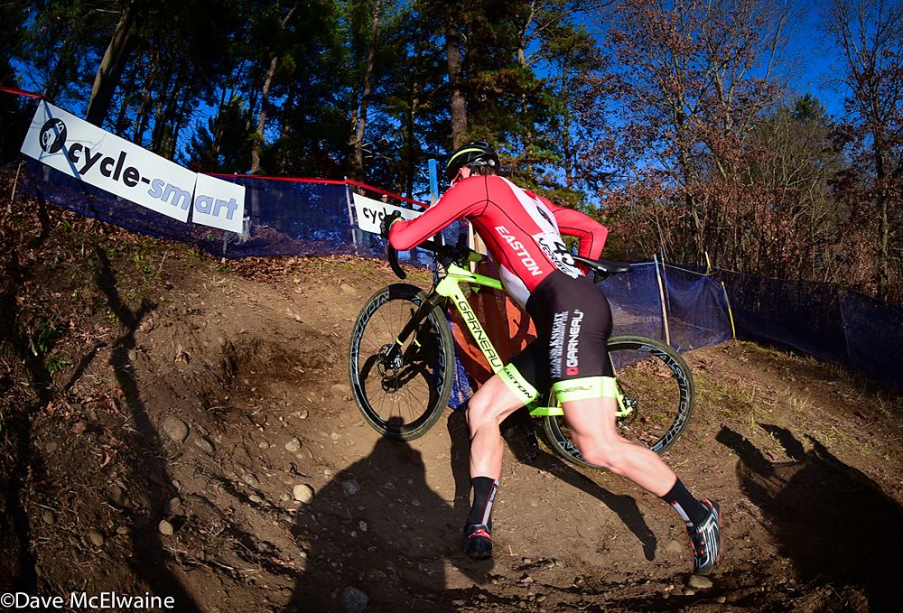 Raphael Gagne (Red Truck-Garneau) running the uphill switchbacks alone