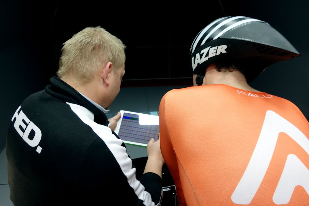 Dino Edin and Colin Joyce go over the data. Data is collected from each run and displayed in a chart for easy reference.